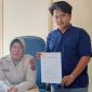 Azi Pangaribuan, Bakal Calon Wakil Bupati Simalungun dan Samsul Pangaribuan selaku mantan Camat Bandar dilaporkan ke Polres Simalungun (Ist.)