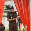 Wakil Jaksa Agung, Feri Wibisono, membacakan sambutan Jaksa Agung ST Burhanuddin dalam Hakordia 2024 yang merespons melorotnya perimgkat IPK Indonesia. (Indonesiawatch.id/Dok. Kejagung)