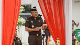 Wakil Jaksa Agung, Feri Wibisono, membacakan sambutan Jaksa Agung ST Burhanuddin dalam Hakordia 2024 yang merespons melorotnya perimgkat IPK Indonesia. (Indonesiawatch.id/Dok. Kejagung)