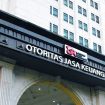 Penyidik KPK geledah kantor OJK.
